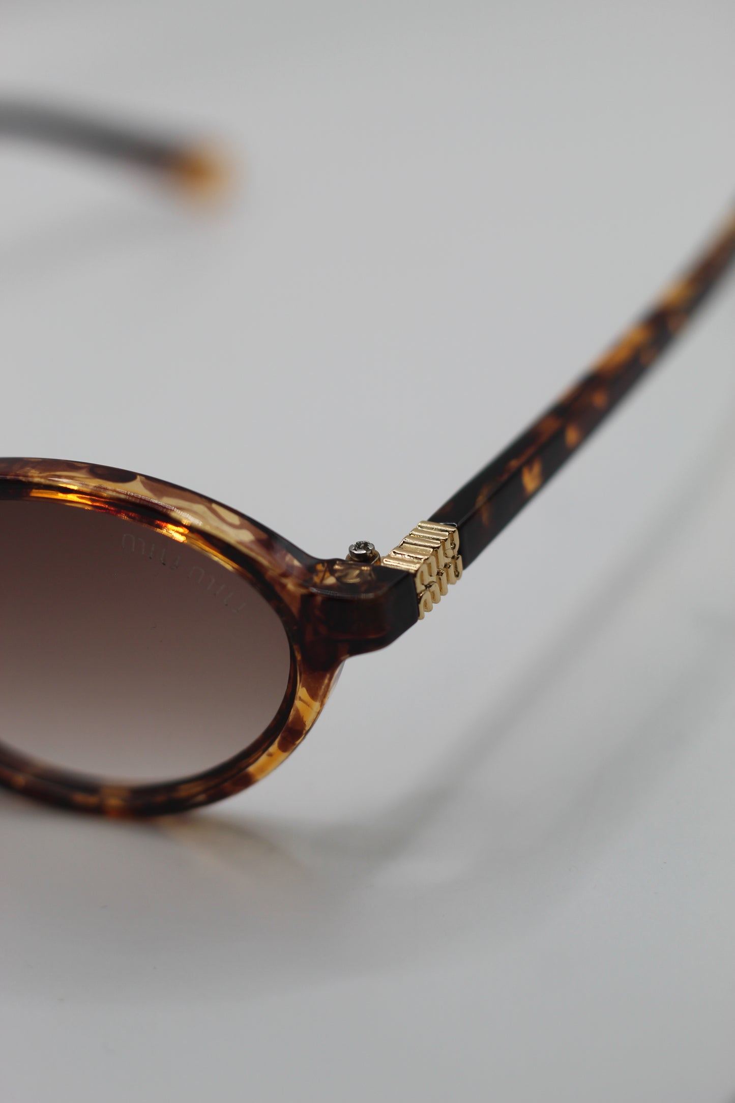 Lentes Miu Miu