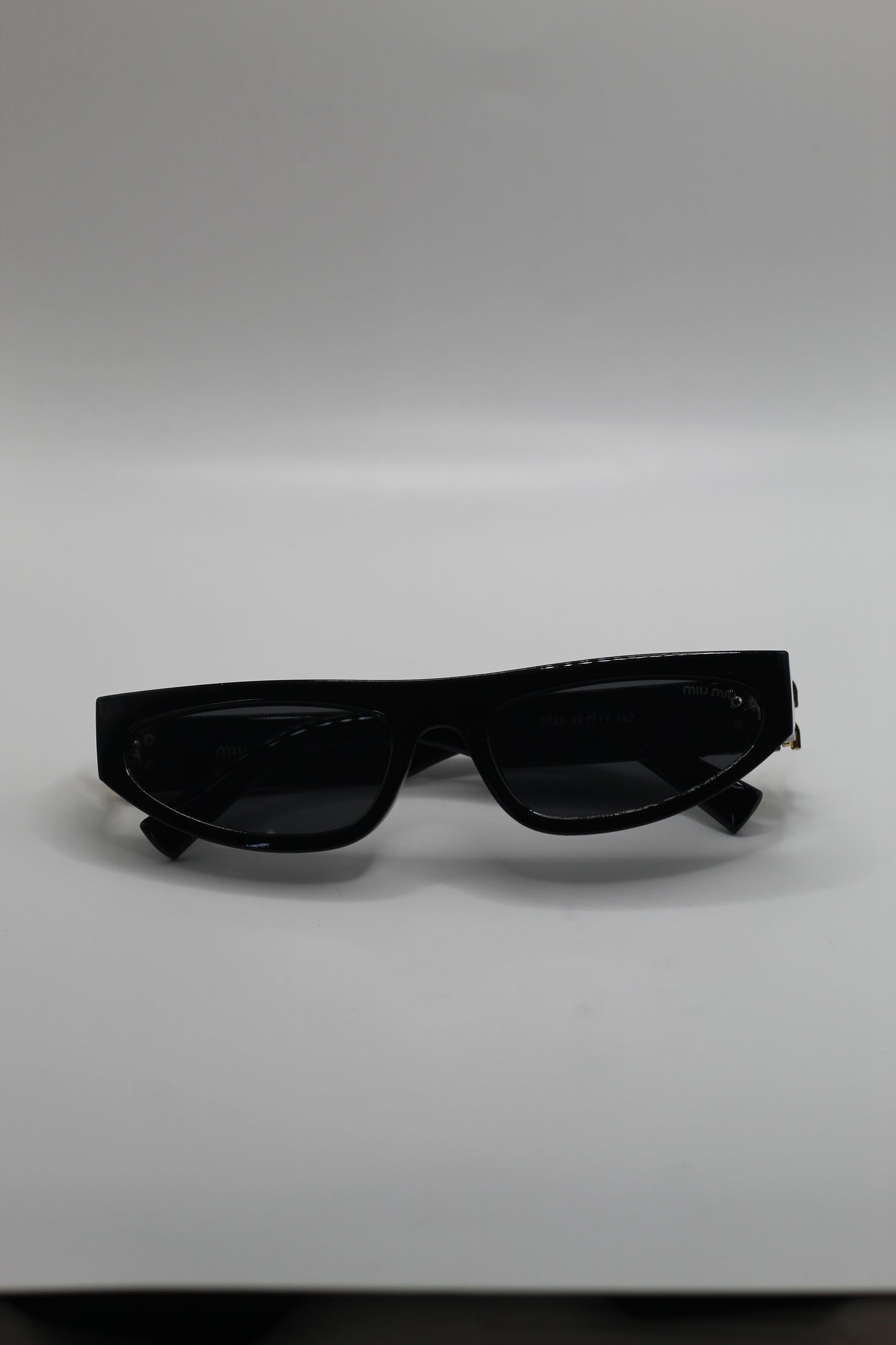 Lentes Miu M