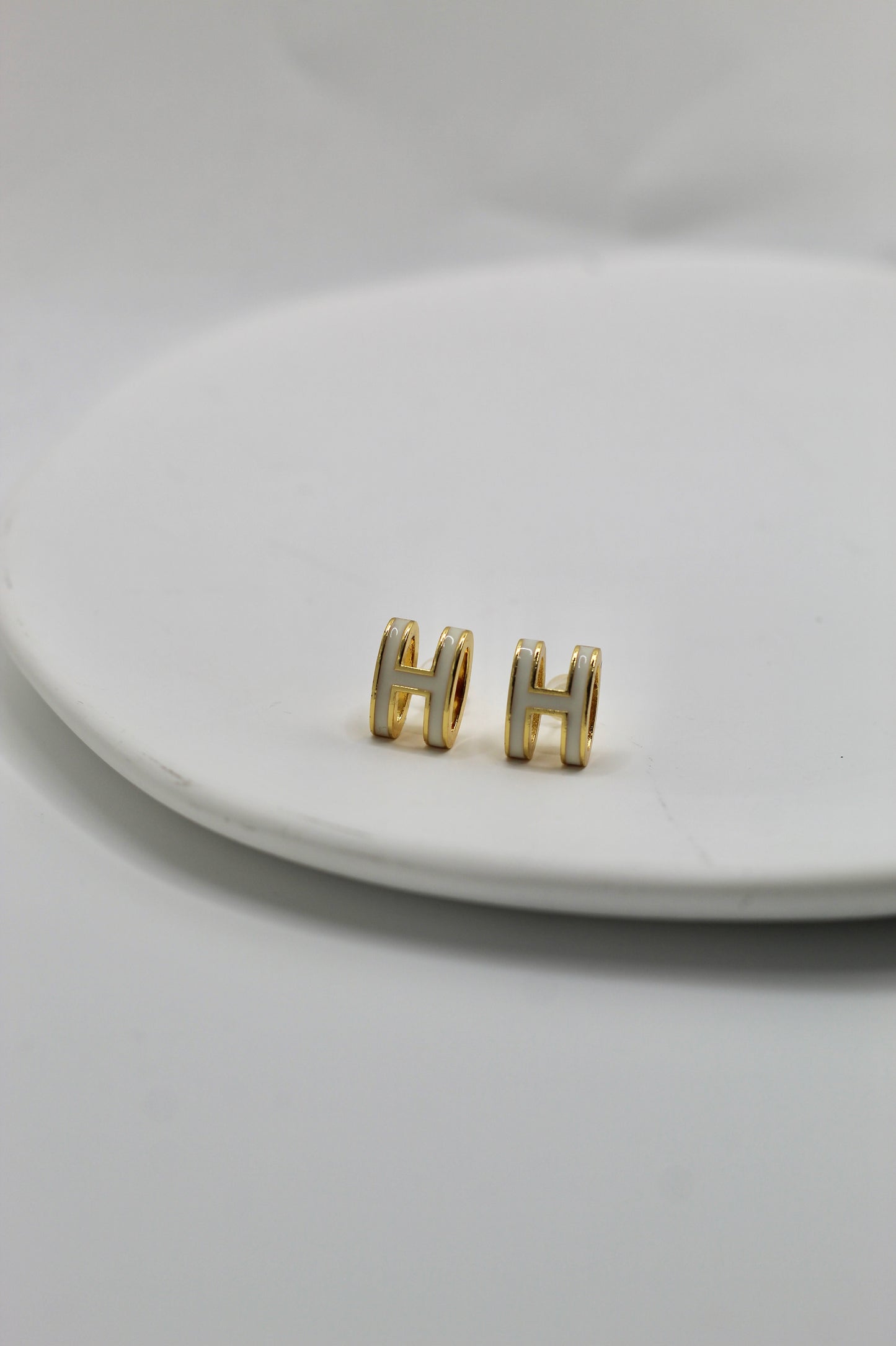 Pendientes H
