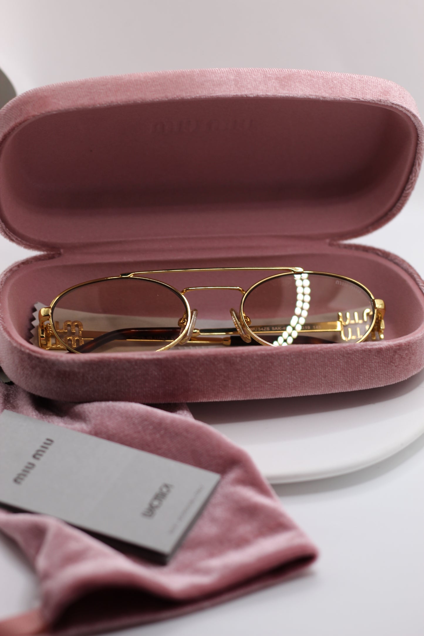 Lentes Miu M