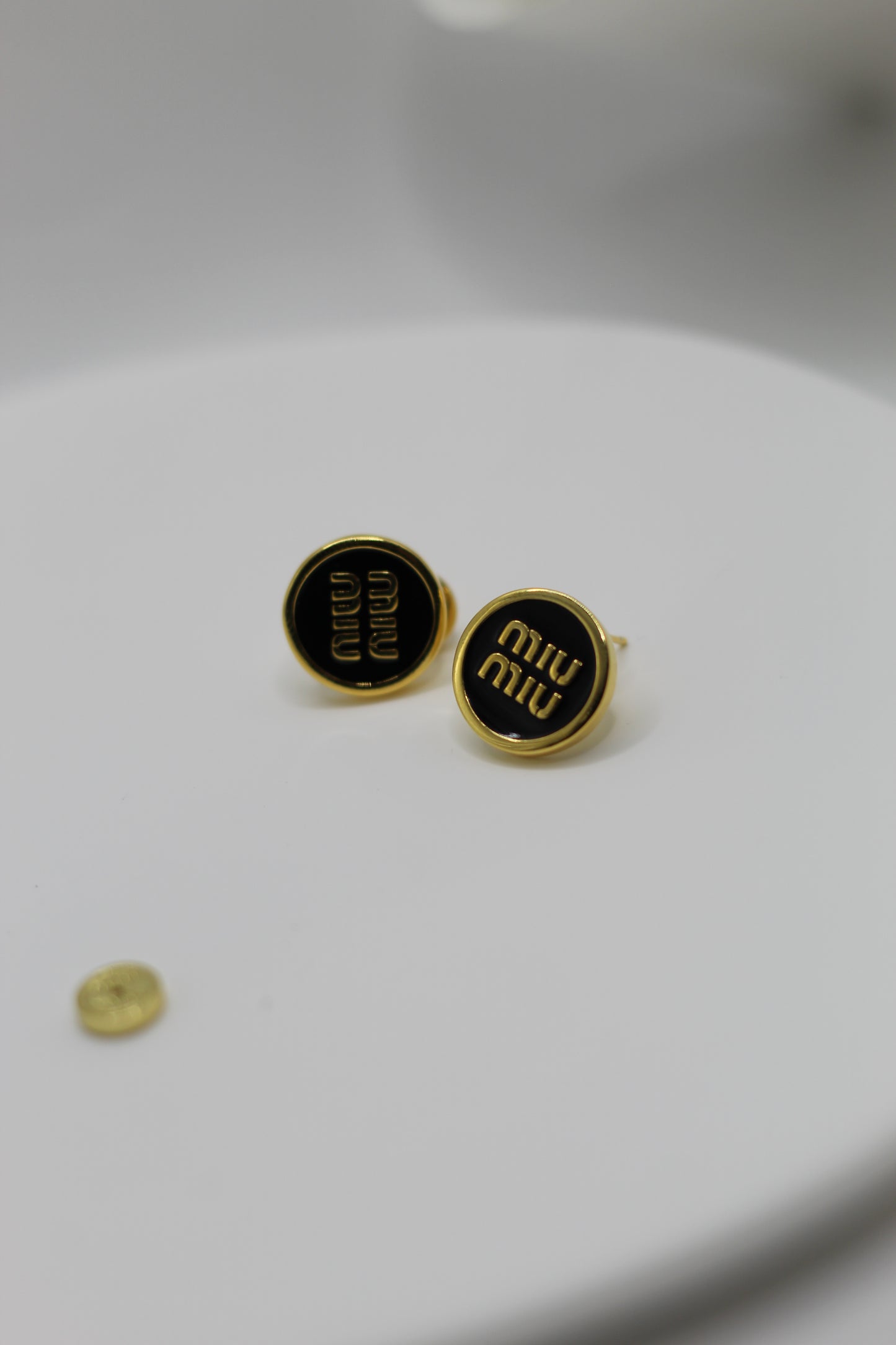 Pendientes Miu M