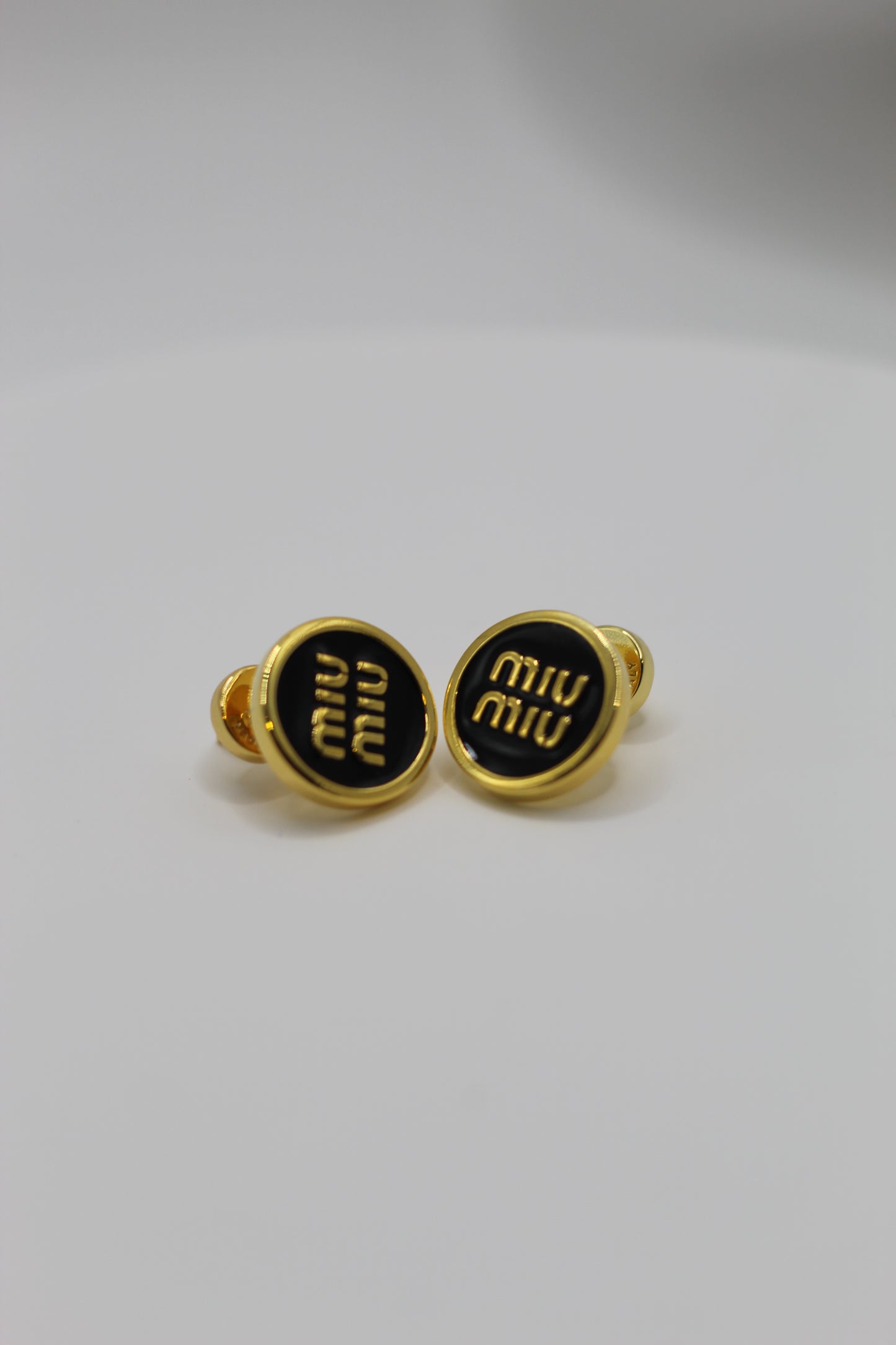 Pendientes Miu M