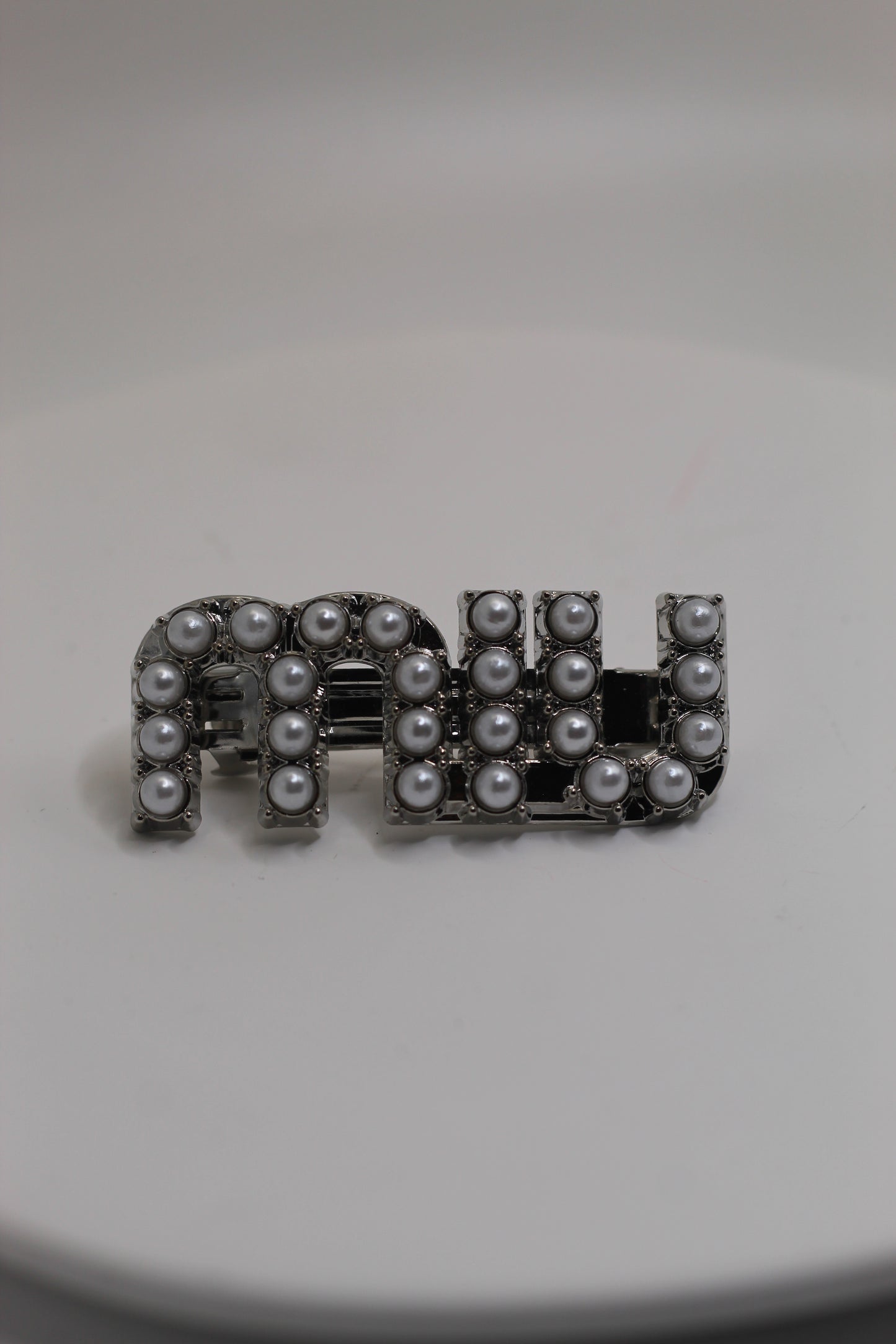 Broche Miu M