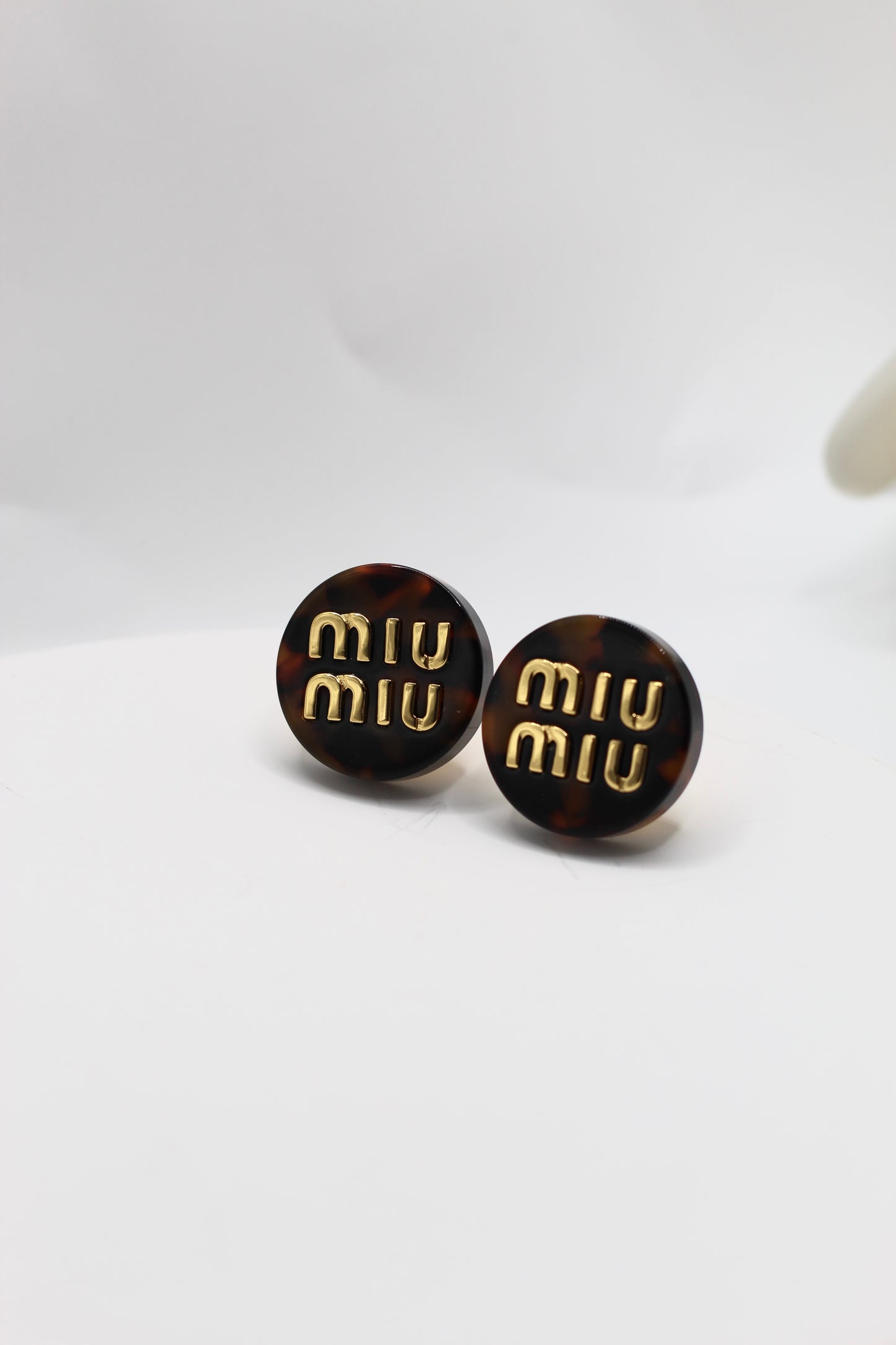 Pendientes Miu M