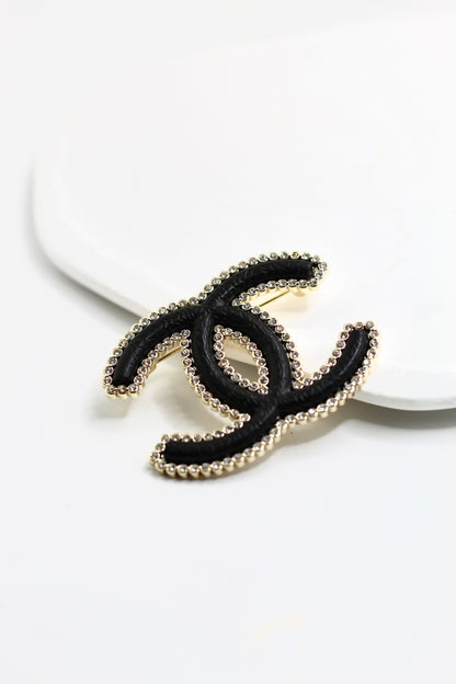 Broche Ch
