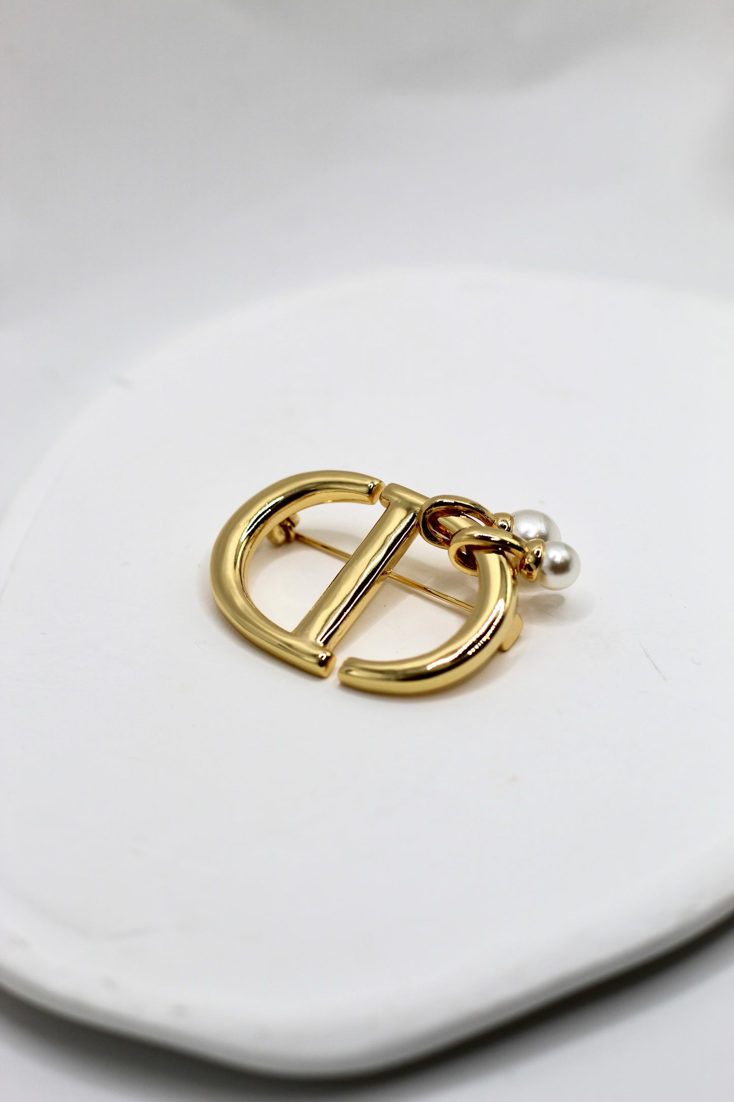 Broche CD