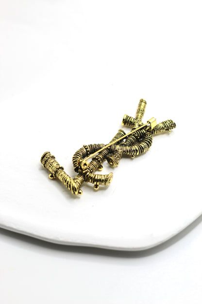 Broche YSL